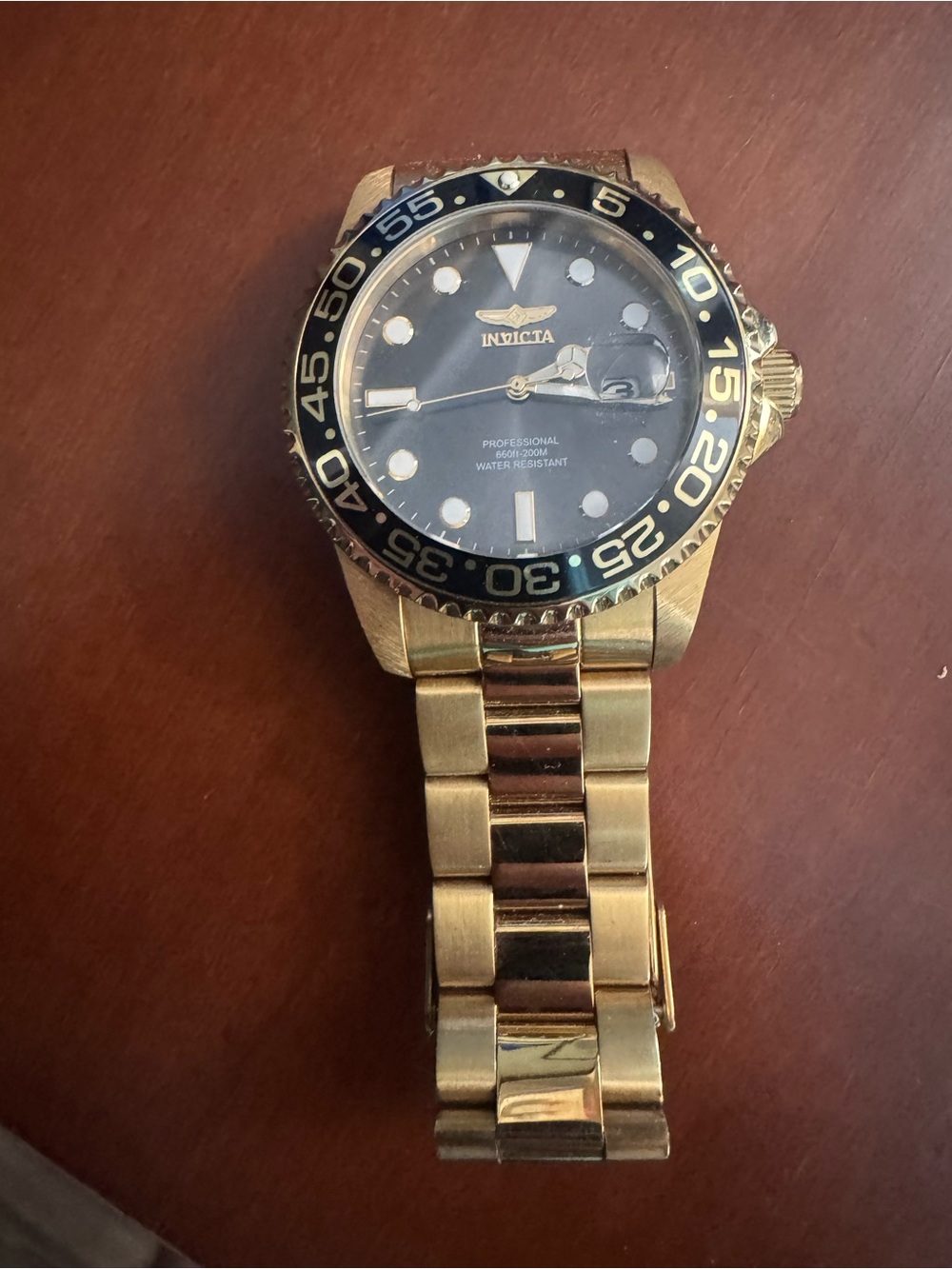 Invicta Gold Tone Men's Watch with Black Dial and Bezel